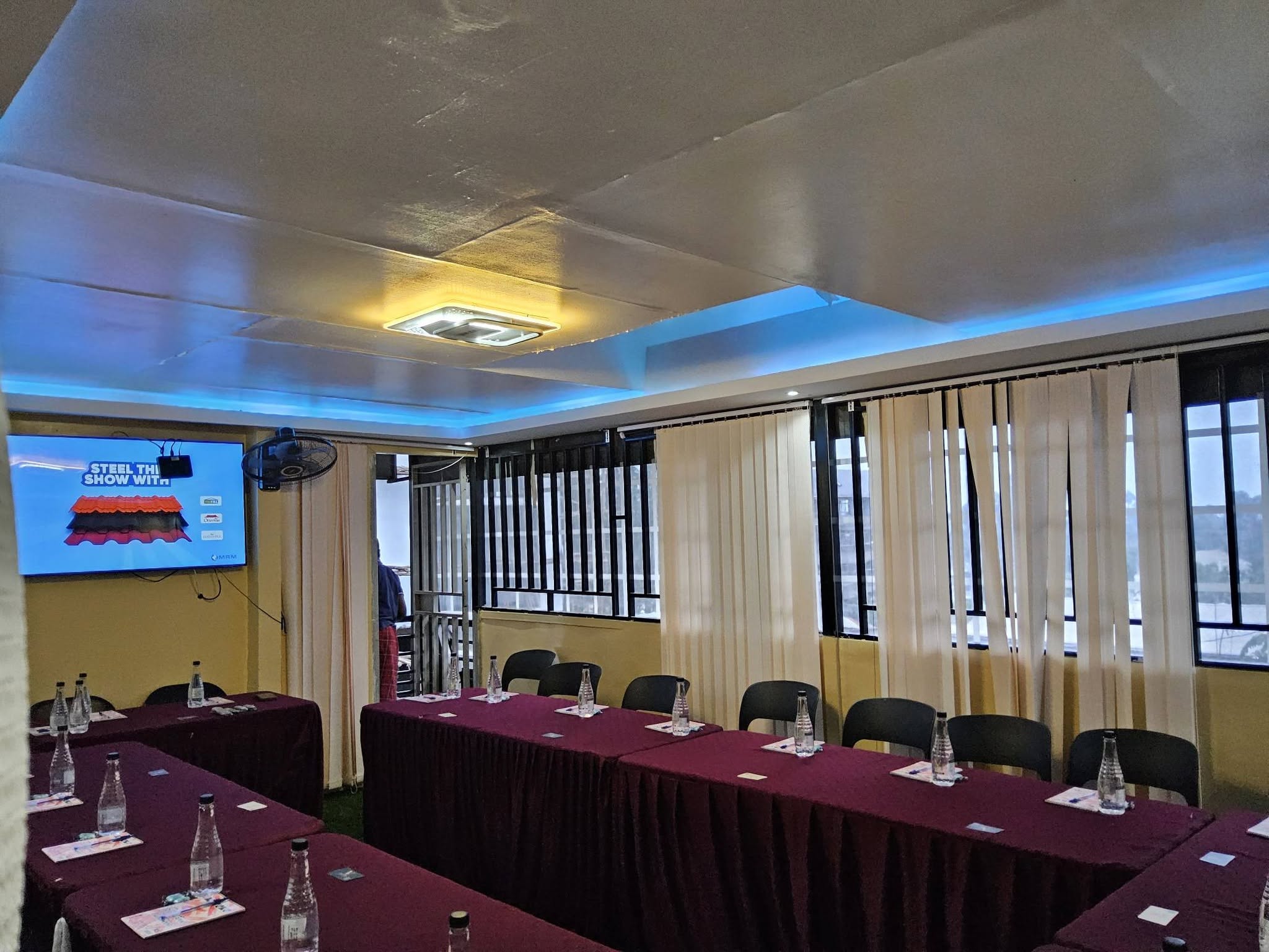 Conference hall set up with rows of seating